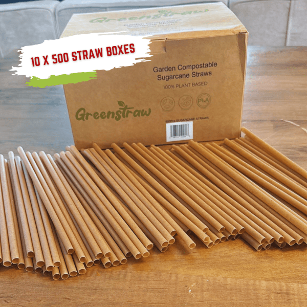 8" standard sugarcane straws spread on a table